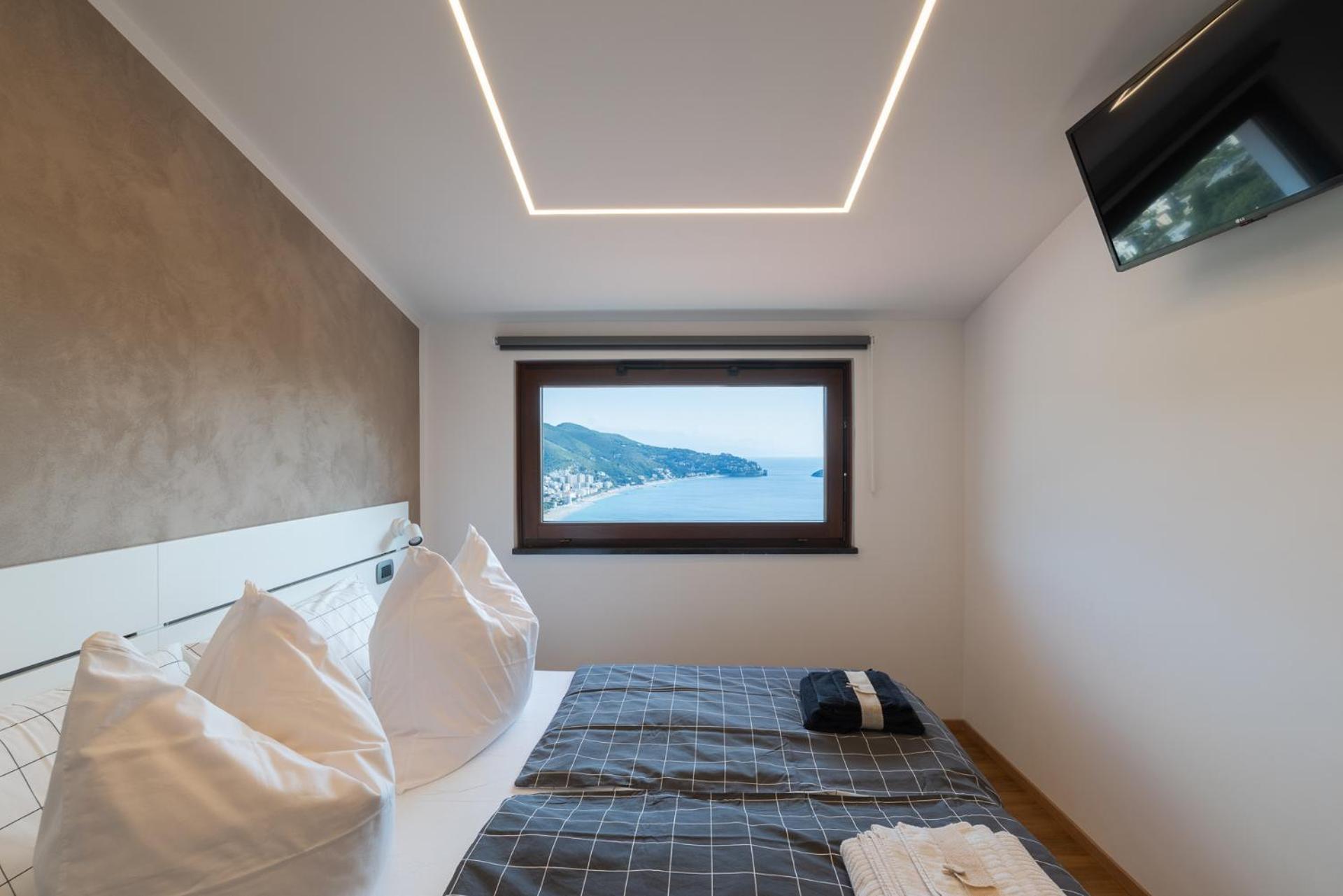 Spettacolare Vista Isola Terrazza E Idromassaggio Villa Noli Bagian luar foto